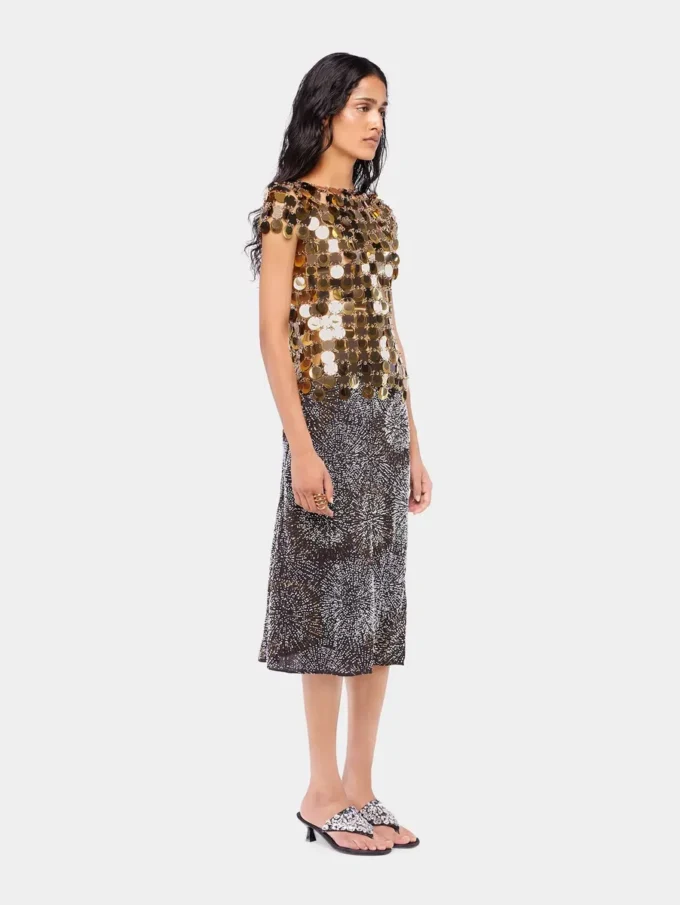 Top dorado con discos brillantes Top dorado con discos brillantes
