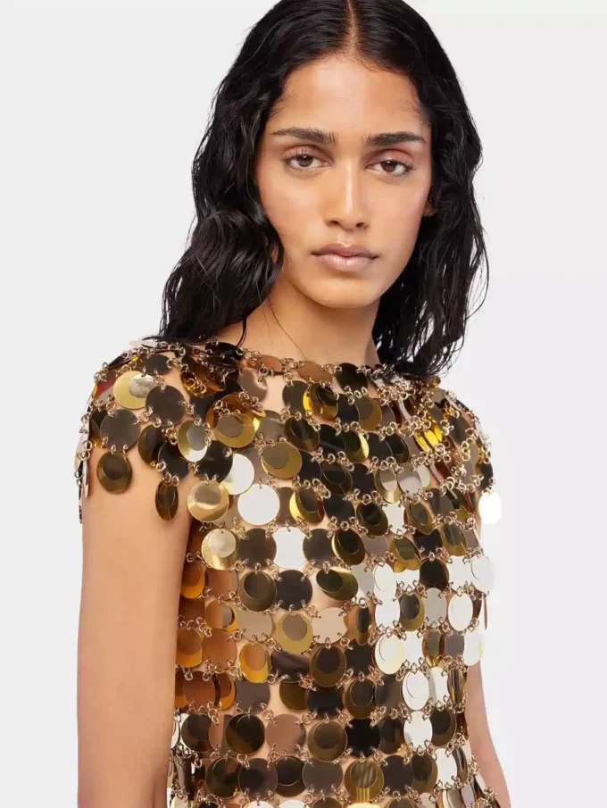 Top dorado con discos brillantes Top dorado con discos brillantes